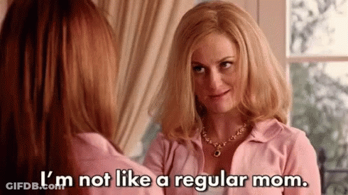 Woman In Pink Shirt Talking To Another Woman By Window GIF