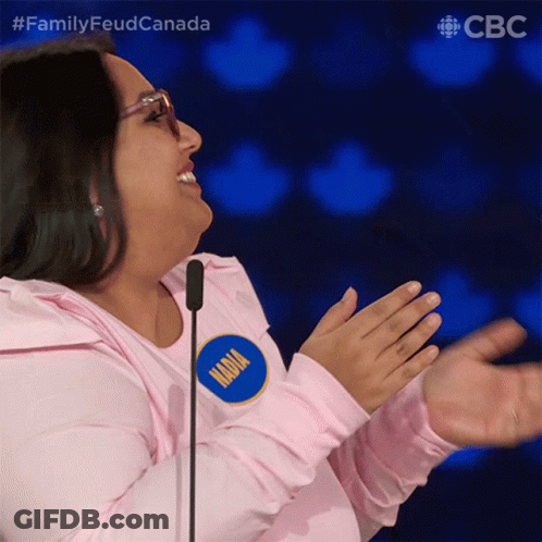 Woman In Pink Shirt With Nadya Name Tag GIF