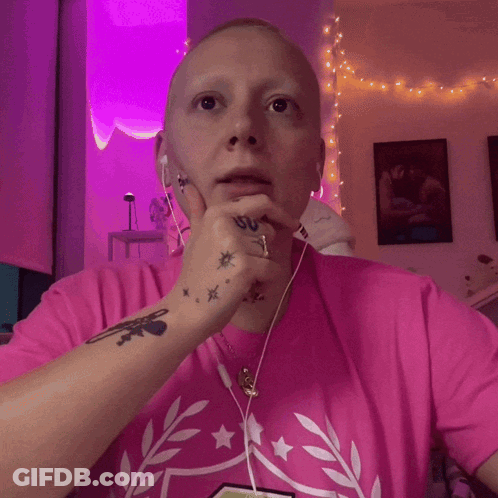Woman In Pink Shirt With Number 1 Screaming GIF