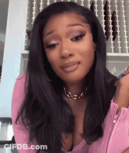 Woman In Pink Sweater And Necklace GIF