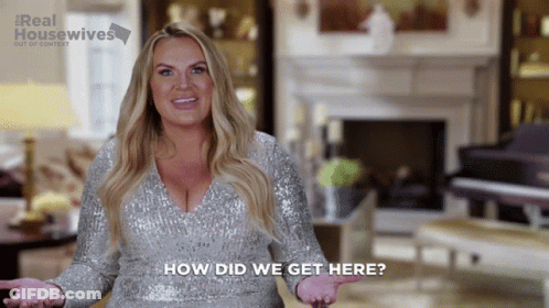 Woman In Pink Sweater Saying I Am Overwhelmed GIF