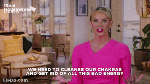 Woman In Pink Sweater Saying We Need To Cleanse Our Chakras GIF