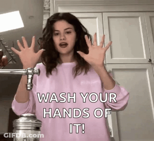 Woman In Pink Sweater Telling To Wash Hands GIF