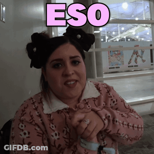 Woman In Pink Sweater With Eso On Face GIF
