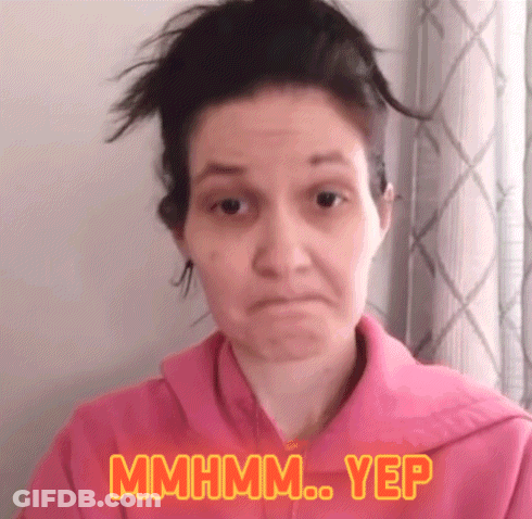 Woman In Pink Sweatshirt Making Funny Face GIF