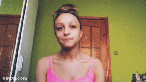 Woman In Pink Tank Top GIF
