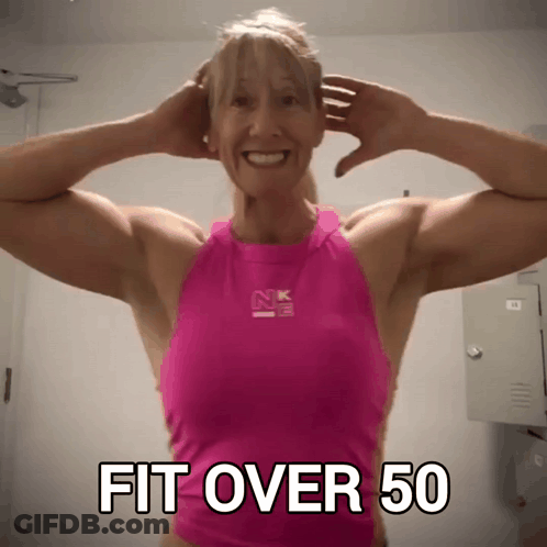 Woman In Pink Tank Top Saying Fit Over 50 GIF