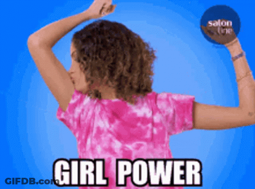 Woman In Pink Tie Dye Shirt Flexing Girl Power GIF