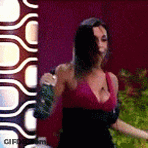 Woman In Pink Top And Black Skirt Dancing GIF