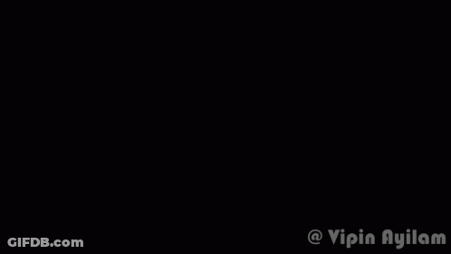 Woman In Pink Top And Red Headband Pointing GIF
