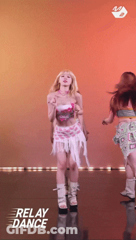 Woman In Pink Top And White Skirt Dancing GIF
