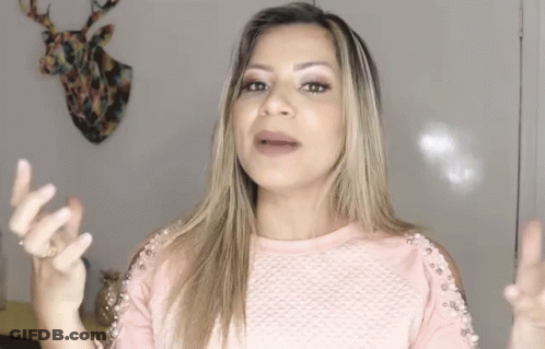 Woman In Pink Top Talking GIF