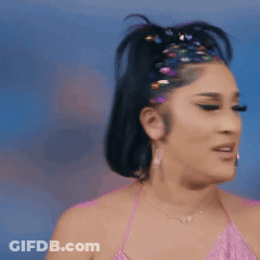 Woman In Pink Top With Rhinestone Headband GIF