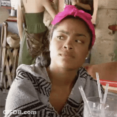 Woman In Pink Turban With Glass Of Water And Straws GIF