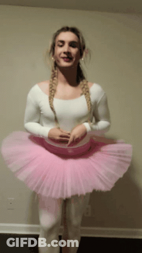 Woman In Pink Tutu And White Top GIF
