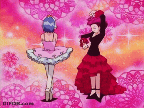 Woman In Pink Tutu Next To Woman In Red Skirt GIF