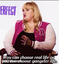 Woman In Pink Varsity Jacket Talking GIF