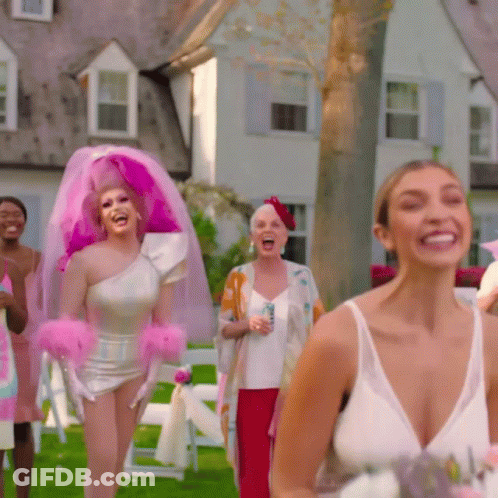 Woman In Pink Veil And Gloves Laughing GIF
