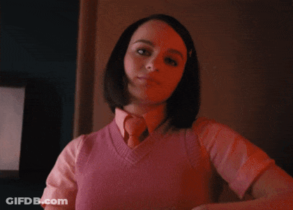 Woman In Pink Vest And Tie Saying Brilliant Plan GIF