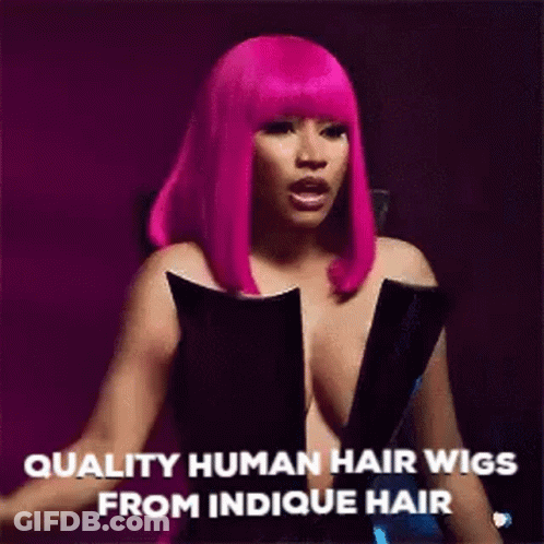 Woman In Pink Wig And Black Dress Talking About Indicue Hair GIF
