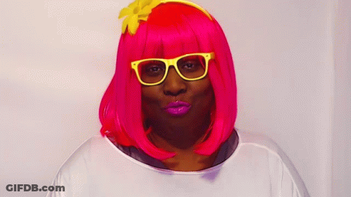 Woman In Pink Wig And Yellow Glasses GIF