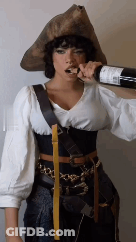 Woman In Pirate Costume Drinking Wine GIF