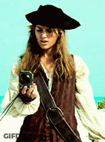 Woman In Pirate Outfit Holding Gun GIF