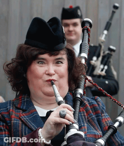 Woman In Plaid And Man Playing Bagpipes GIF