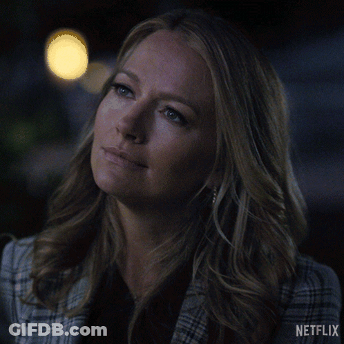 Woman In Plaid Jacket Saying Uh-Huh GIF
