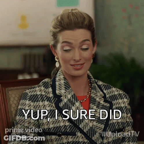 Woman In Plaid Jacket Saying Yup GIF