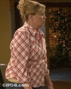 Woman In Plaid Shirt And Jeans GIF