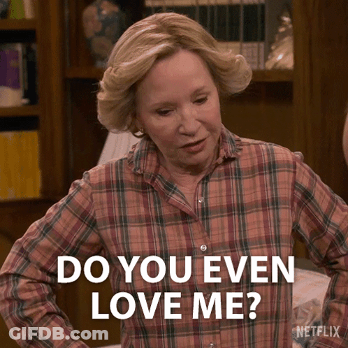 Woman In Plaid Shirt Asking Do You Love Me GIF