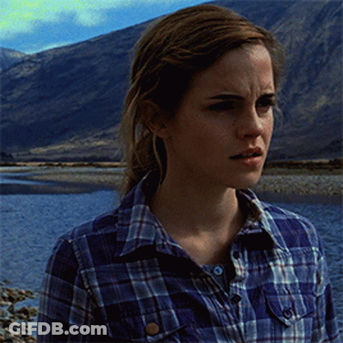 Woman In Plaid Shirt By River GIF