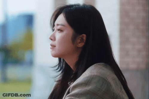 Woman In Plaid Shirt Close Up GIF