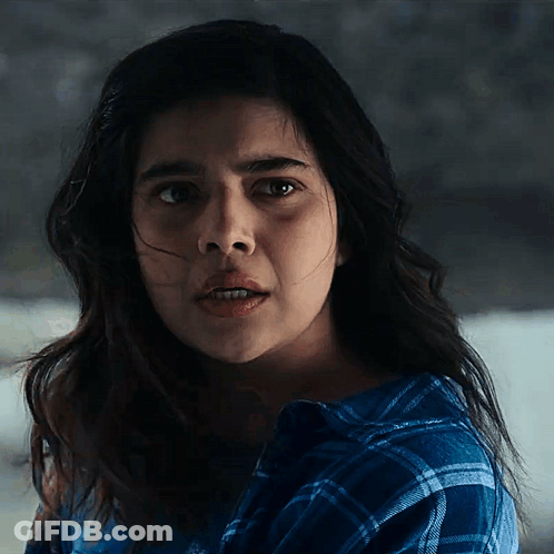 Woman In Plaid Shirt Close Up GIF