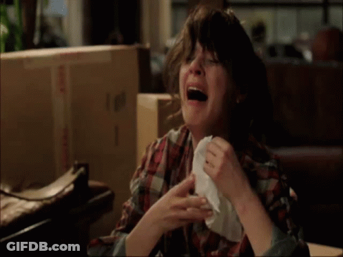 Woman In Plaid Shirt Crying With Napkin GIF