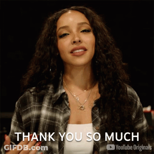 Woman In Plaid Shirt Giving Thank You So Much Sign GIF