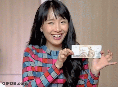 Woman In Plaid Shirt Holding 5000 Bill GIF