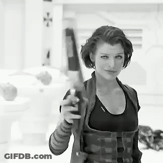 Woman In Plaid Shirt Holding Gun Black And White GIF
