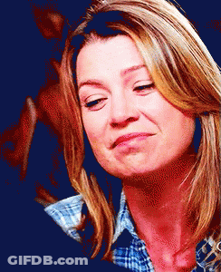 Woman In Plaid Shirt Making A Face GIF
