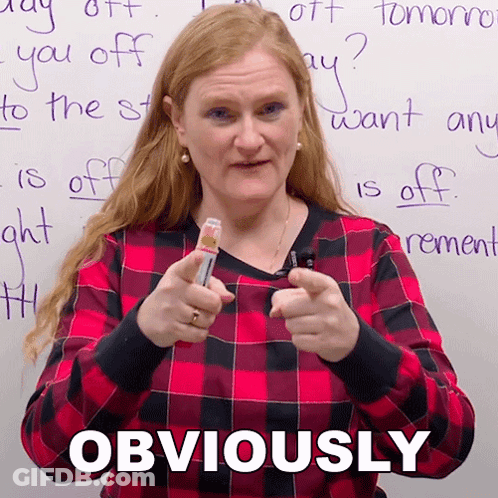 Woman In Plaid Shirt Pointing At Camera Obviously GIF