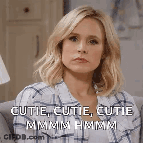 Woman In Plaid Shirt Saying Cutie Cutie Cutie GIF