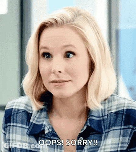 Woman In Plaid Shirt Saying Oops Sorry GIF