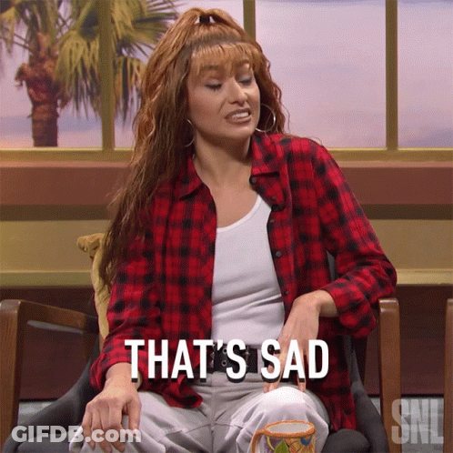 Woman In Plaid Shirt Saying That's Sad GIF