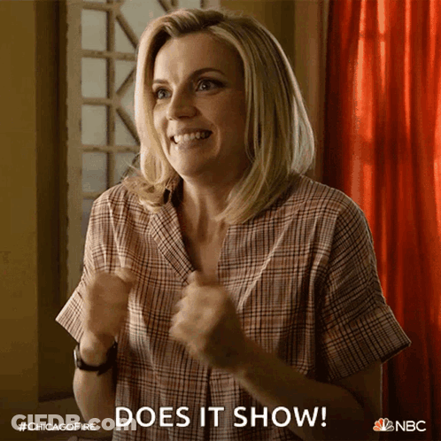 Woman In Plaid Shirt Says Does It Show GIF