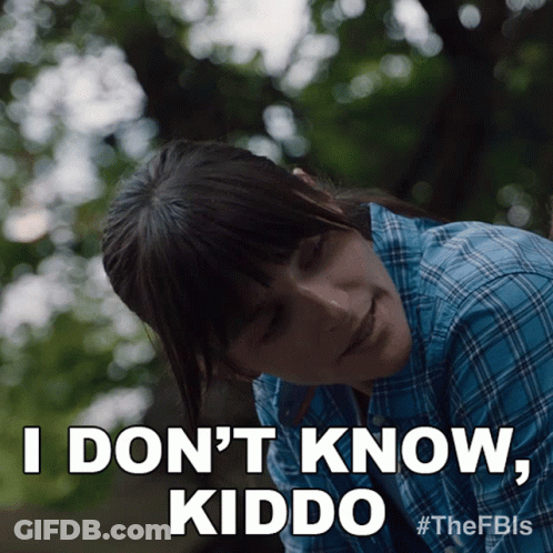 Woman In Plaid Shirt Says I Don't Know Kiddo GIF