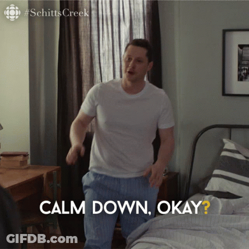 Woman In Plaid Shirt Says That Was A Joke GIF
