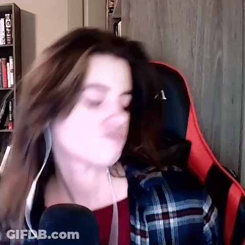 Woman In Plaid Shirt Singing GIF
