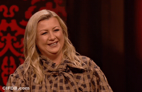 Woman In Plaid Shirt Smiling GIF