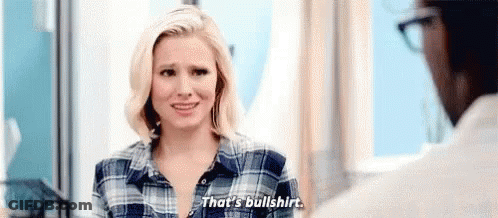 Woman In Plaid Shirt Talking To Man GIF